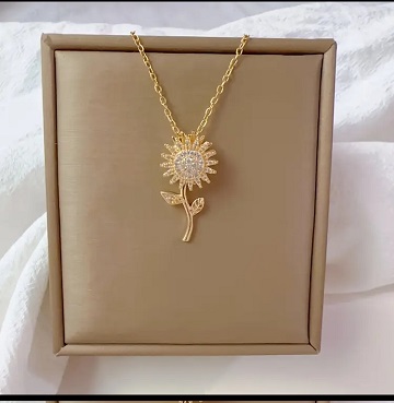 Cadena de girasol giratorio anti stress, de acero inoxidable chapado en oro 18 K.