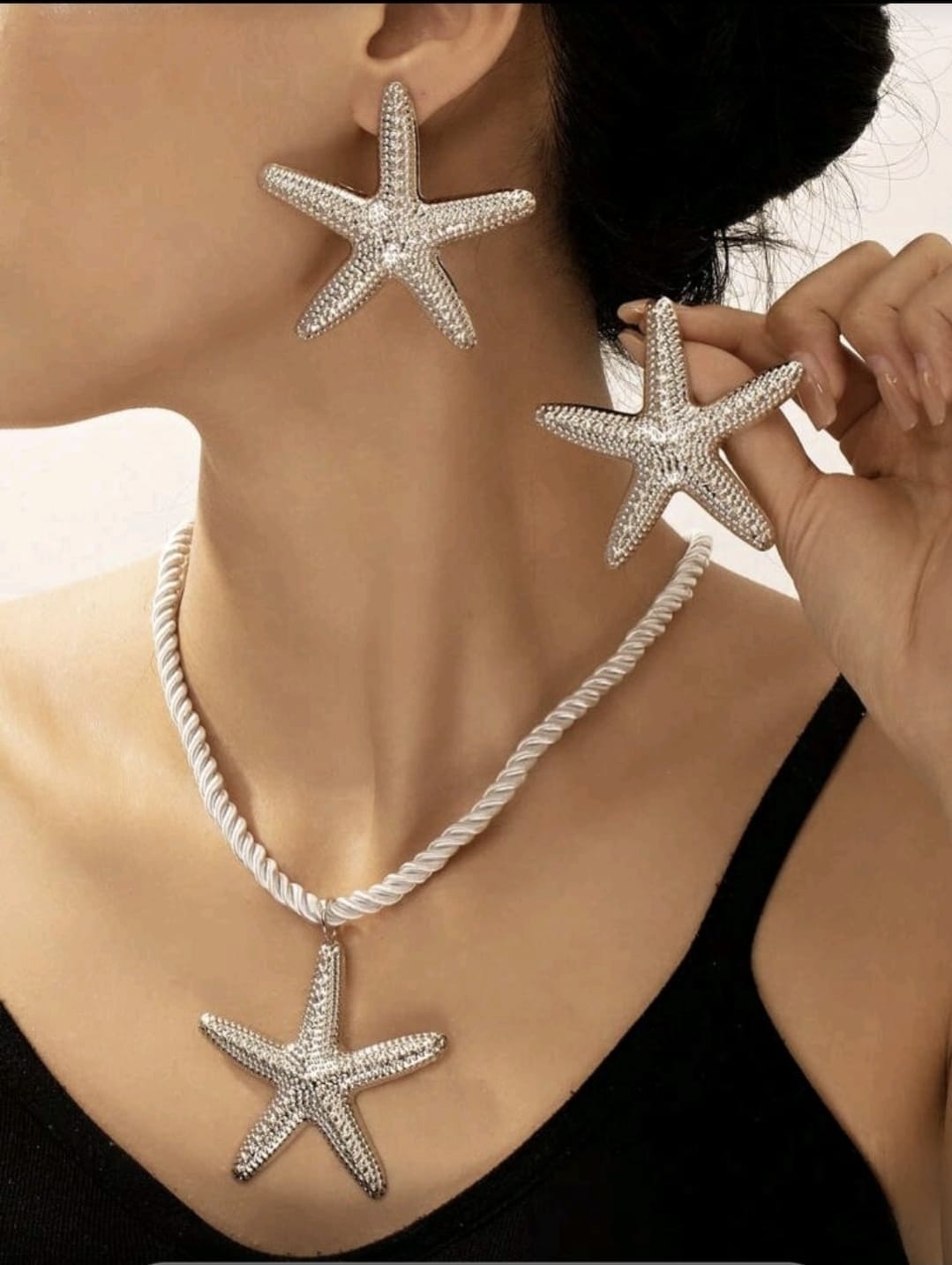 Set de collar con colgante de estrella de mar.